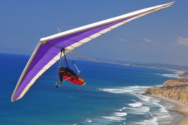 Hang glider over the cliffs at Torrey Pines Gliderport