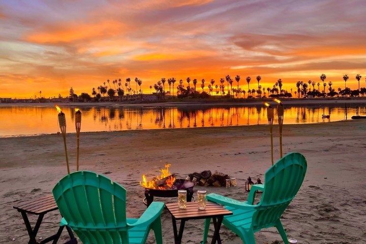 Beach fire pits at sunset on Mission Bay
