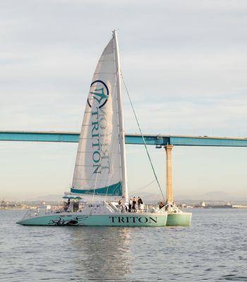 The Triton catamaran passing the Coronado Bridge