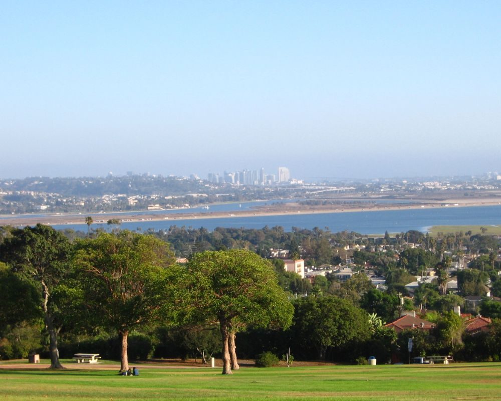 View over Mission Bay and the ocean from the lawn at Kate Sessions Park